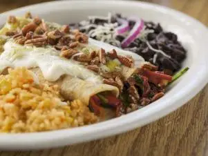 Garden Enchiladas as prepared by Chef Ernie at Magnolia Cafe in Austin, Texas, as seen on Food Network's Triple D Nation, season 8.