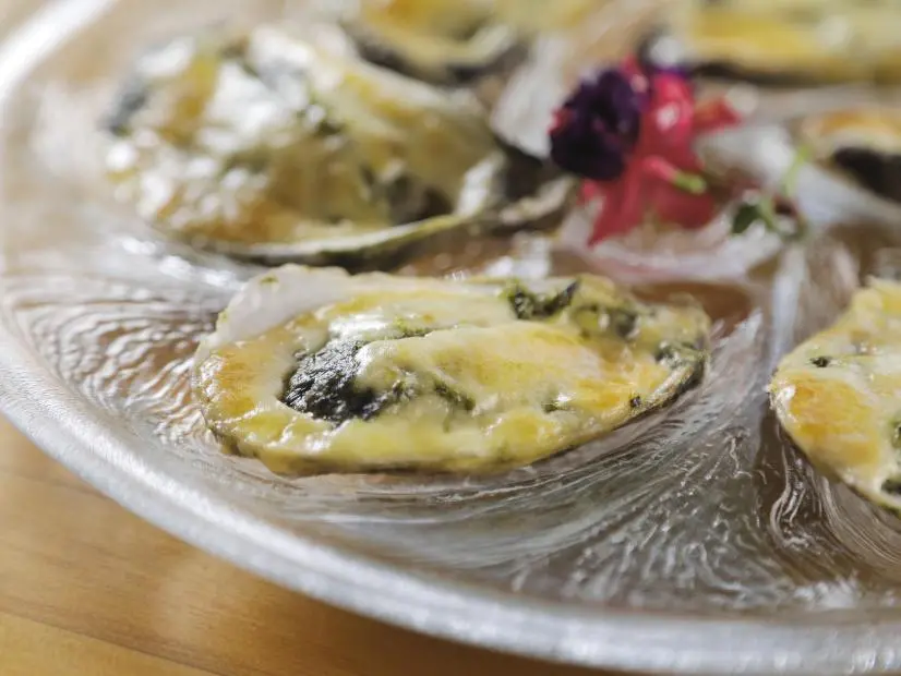 Oysters Rockefeller as prepared by Chef/Owner Dana Tillman at Dana's Kitchen in Boston, Massachusetts, as seen on Food Networks Triple D Nation, season 8.