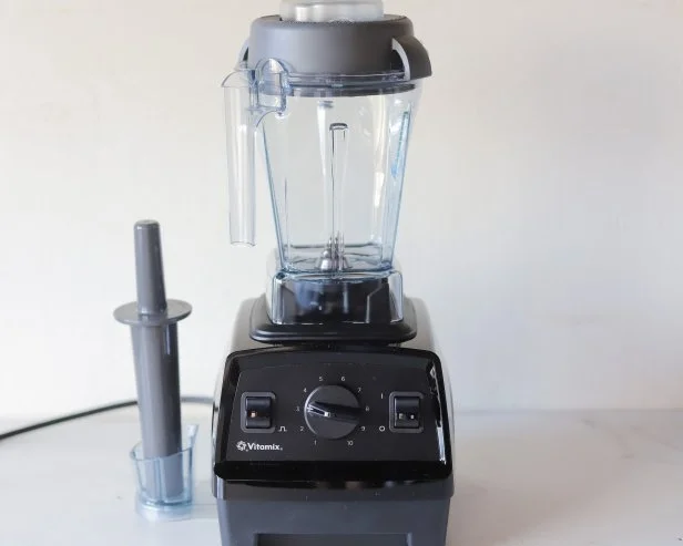 Vitamix Explorian blender on white countertop