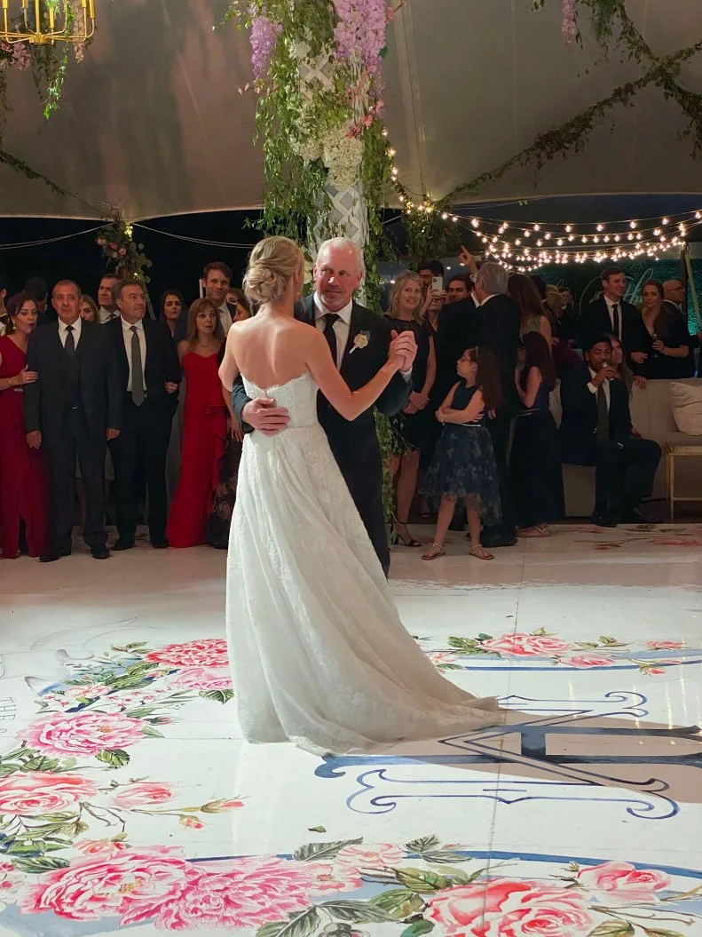 Ladd Drummond dances with his daughter, Paige, at her wedding.