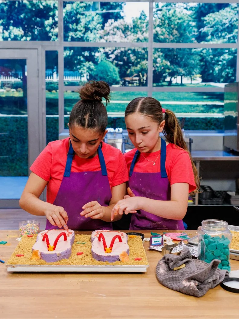 Contestants Leila and Melody Nouri's dish, Yellow Cake with Strawberry Frosting, as seen on Baking Championship: Next Gen, Season 1.