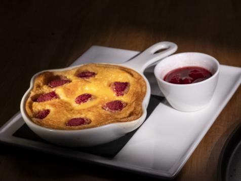 Raspberry Clafoutis with Bourbon Raspberry Flambé Sauce