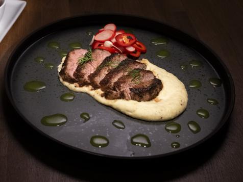 Seared Loin of Lamb with Puréed Celery Root, Pickled Radishes and Basil-Mint Oil