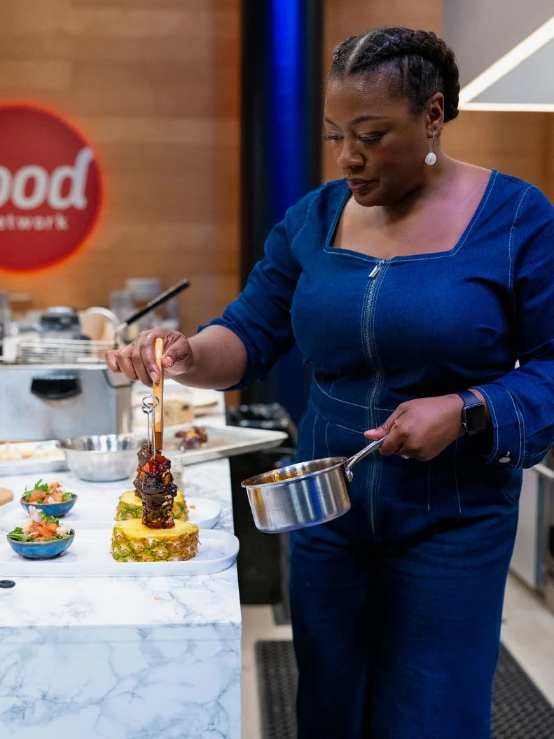 Contestant Tiffany Derry, cooking process, as seen on Wildcard Kitchen, Season 2.