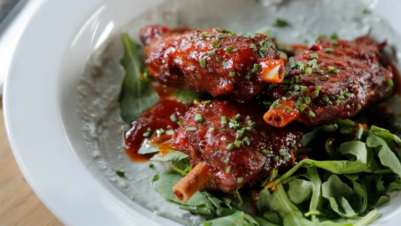 The Agrodolce Pig Wings as Served at South Philadelphia Tap Room in Philadelphia, Pennsylvania, as seen on DDD Nation, special.