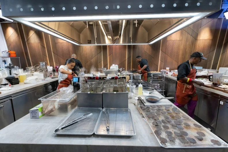 Chefs Fariyal Abdullahi, Marcus Samuelsson, Ed Brumfield and Greg Pena prepare the menu dishes, as seen on The Line, Season 1