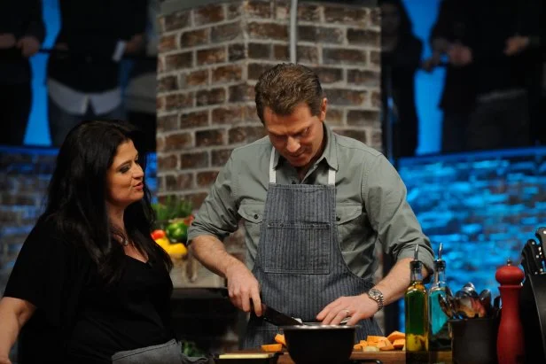 Special Guest Alex Guarnaschelli pesters host Chef Bobby Flay as he cooks, as seen on Food Network's Beat Bobby Flay, Season 5.