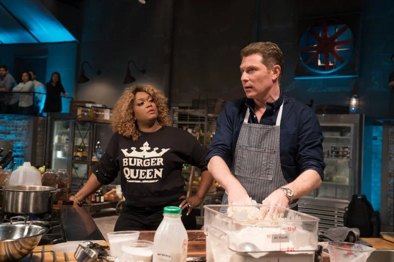 Co-host Sunny Anderson checks in on Bobby Flay as he makes dough, as seen on Food Network's Beat Bobby Flay, Season 11.