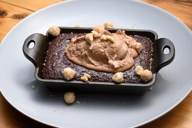 A whiskey chocolate hazelnut cake with hazelnut mousse and candied hazelnuts.