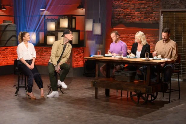 Co-hosts Drew Barrymore and Michael Voltaggio watch as judges Zac Young, Paulette Goto, and Scott Levine sample the Round 2 dishes.