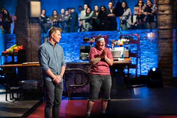 Host Bobby Flay, with Contestant Michele Ragussis, as seen on Beat Bobby Flay, Season 24.