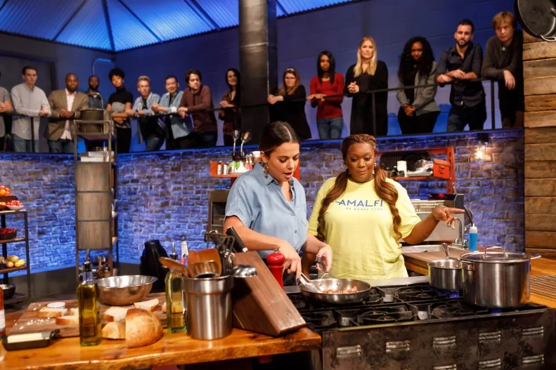 Co-host Sunny Anderson checks in with contender Gabriella Baldwin during Round 1, as seen on Beat Bobby Flay, Season 31.