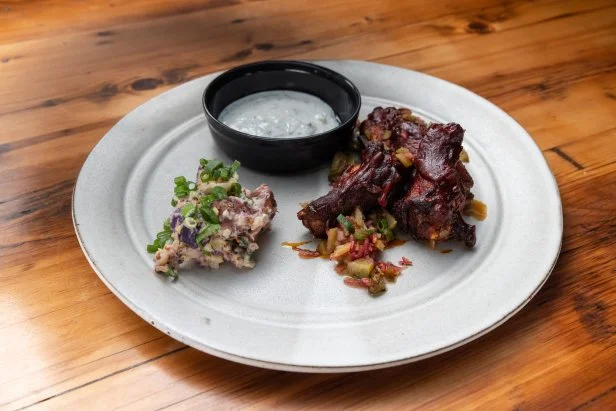 Host Bobby Flay's final dish, BBQ wings, as seen on Beat Bobby Flay, Season 34