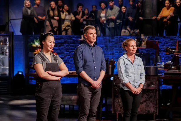 Contender Kaleena Bliss, chef Bobby Flay, and contender Melissa Donahue await the results of Round 1, as seen on Beat Bobby Flay, Season 36.