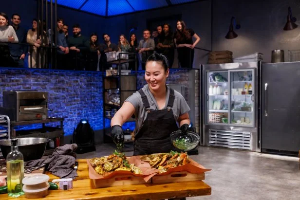 Kaleena Bliss adds the finishing touches to her Round 2 dish, as seen on Beat Bobby Flay, Season 36.
