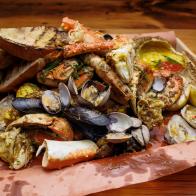Contender Kaleena Bliss' Northwest Dungeness Crab Boil with Crab Butter and Cocktail Sauce, as seen on Beat Bobby Flay, Season 36.