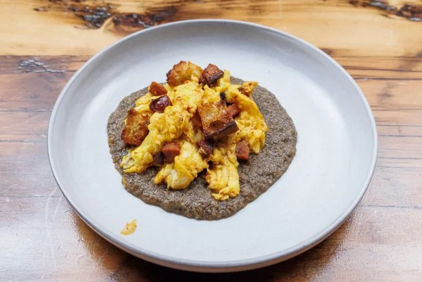 Contender Justin Jacobs' Egg Hash with Kimchi and Chorizo in Sourdough Bread Sauce, as seen on Beat Bobby Flay, Season 40.