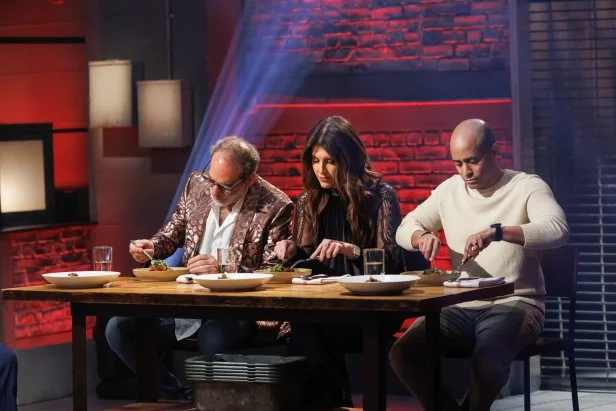 Judges Frank Prisinzano, Lauren Scala, and Michael Jenkins taste the Round 1 dishes, as seen on Beat Bobby Flay, Season 40.