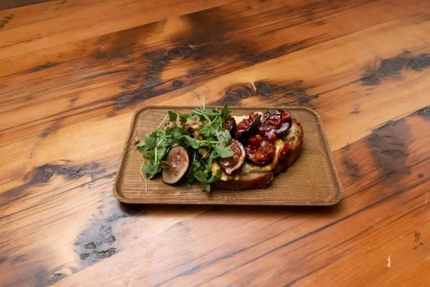 Contender Esther Choi's Roasted Fig Crostini with Kimchi Goat Cheese Spread and Fresh Fig Salad, as seen on Beat Bobby Flay: Holiday Throwdown.