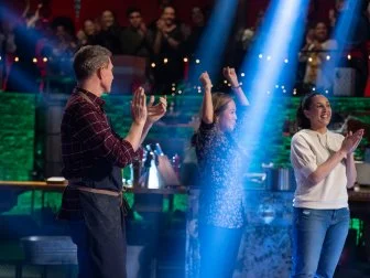 Chef Bobby Flay and contender Leah Cohen applaud contender Esther Choi's win, as seen on Beat Bobby Flay: Holiday Throwdown.