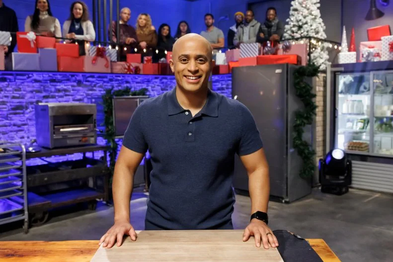 Contender Michael Jenkins poses at her station before Round 1, as seen on Beat Bobby Flay: Holiday Throwdown, Season 4.