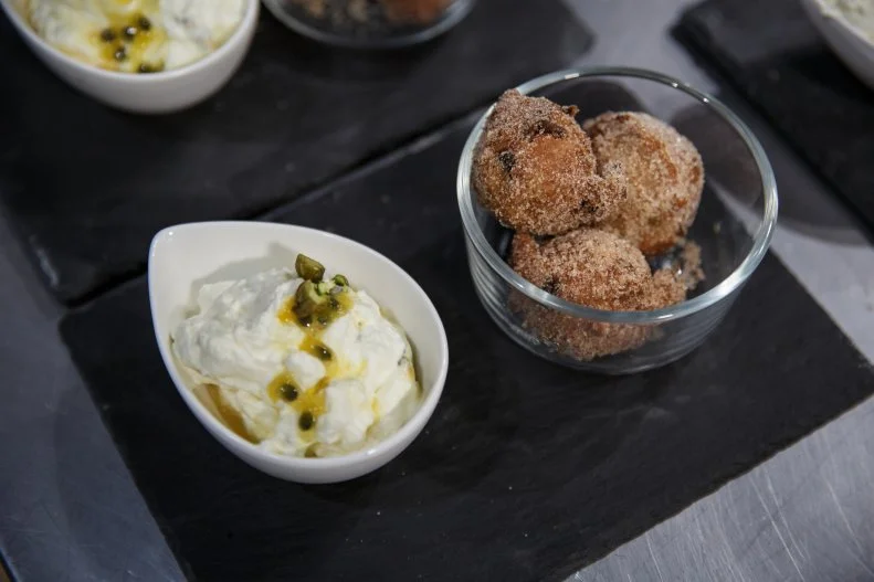 Contestant Kaleena Bliss' desert dish vegan turkey log and whiskey cherry dougnut with passion fruit mousse, as seen on Chopped Casino Royale Tournament, Season 51.