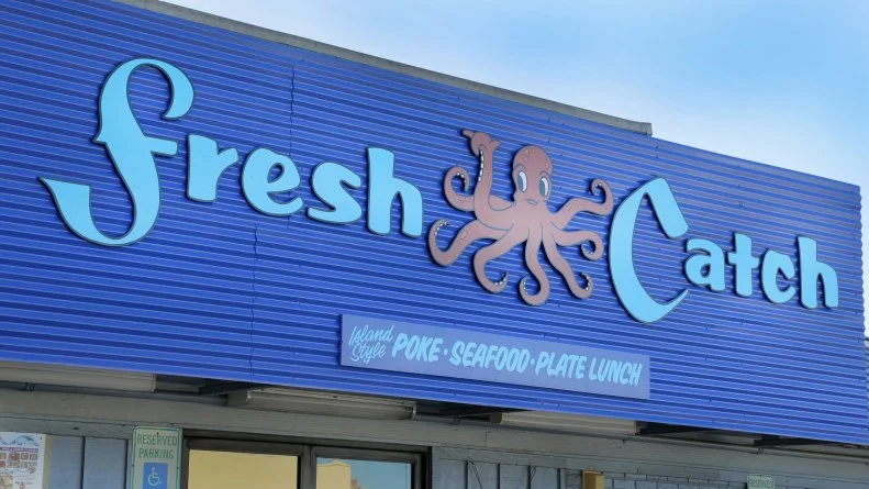 Front Exterior Signage at Fresh Catch in Honolulu, Hawaii as seen on Diners, Drive-Ins and Dives: Take Out episode, season 32.