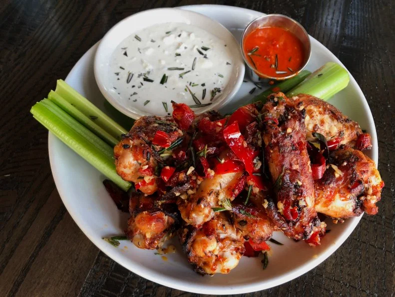 The Calabrian Glazed Chicken Wings as served at Dough Pizzeria Napoletana in San Antonio, Texas, as seen on Diners, Drive-Ins and Dives: Take Out, season 33.