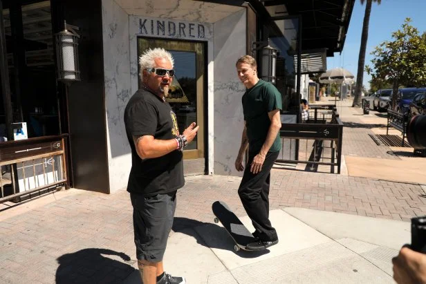 Guy Fieri and guest host Tony Hawk tape the introduction at Kindred in San Diego, California, as seen on Diners, Drive-Ins and Dives, season 36.
