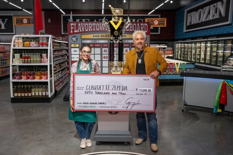 Winner Claudette Zepeda with host Guy Fieri, as seen on Guy's Grocery Games, Season 41.