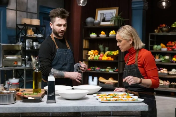 Chef Alex Stupak and Titan Brooke Williamson check out each others round 1 dishes , as seen on Bobby’s Triple Threat, Season 5