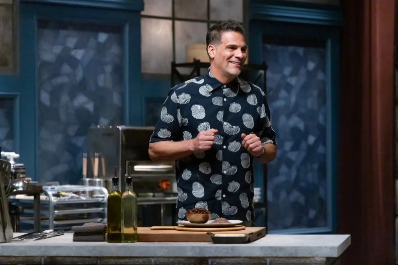 Chef Angelo Sosa reveals his secret ingredients for round 3 to Host Bobby Flay and Titan Ayesha Nurdjaja, as seen on Bobby’s Triple Threat, Season 5