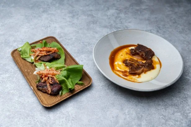 Chef Esther Choi's round 1 dish, BRAISED SPICY SHORT RIBS WITH A GARLIC CREAM POTATO, GRILLED SHORT RIB LETTUCE WRAP WITH PEAR KIMCHI, as seen on Bobby's Triple Threat,  Season 2