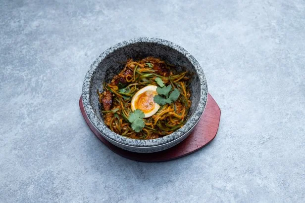 Titan Brooke Williamsons final dish, SHRIMP AND PORK RICE WITH SOY EGG AND A CUCUMBER KIMCHI, as seen on Bobby's Triple Threat,  Season 2
