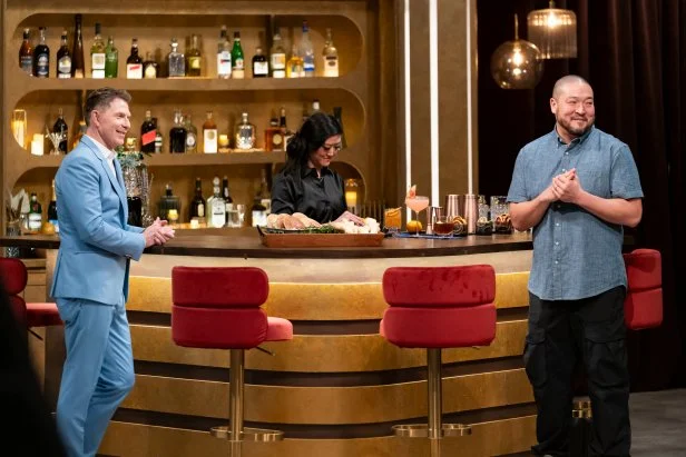 Host Bobby Flay welcomes chef Kevin Lee to the kitchen alongside bartender Ginn Choe, as seen on Bobby's Triple Threat, Season 3.