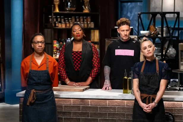 Chef Ashleigh Shanti with Titans Tiffany Derry, Michael Voltaggio, and Brooke Williamson during the judging of Round 3, as seen on Bobby's Triple Threat, Season 3.