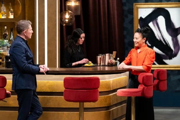 Host Bobby Flay welcomes chef Shirley Chung to the kitchen alongside bartender Ginn Choe, as seen on Bobby's Triple Threat, Season 3.