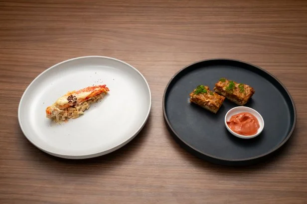 Titan Michael Voltaggio's Round 1 dishes, king crab "plate lunch" with king crab and uni mac salad, and pickled mustard seeds, with king crab toast with fermented red tofu mustard, as seen on Bobby's Triple Threat, Season 3.