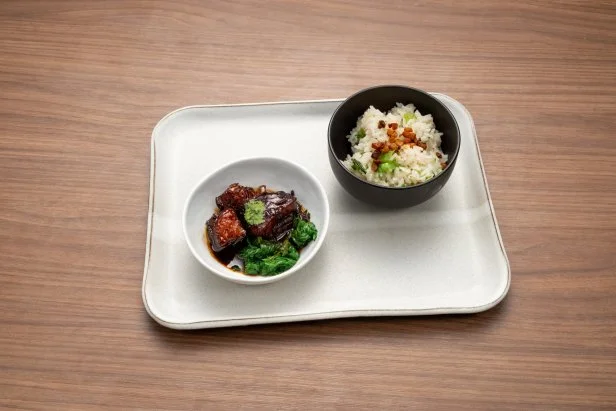 Chef Shirley Chung's Round 3 dish, twice cooked red braised pork belly, with doubanjiang and pork fat mixed rice, with mustard greens, as seen on Bobby's Triple Threat, Season 3.