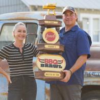 BBQ Brawl Season 7 Master of Cue Chef Bob Trudnak, and Team Captain Brooke Williamson, as seen on BBQ Brawl, Season 7