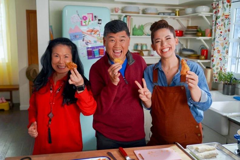 Molly Yeh, her dad and stepmom gather to make Lucky Baloney Rolls. 