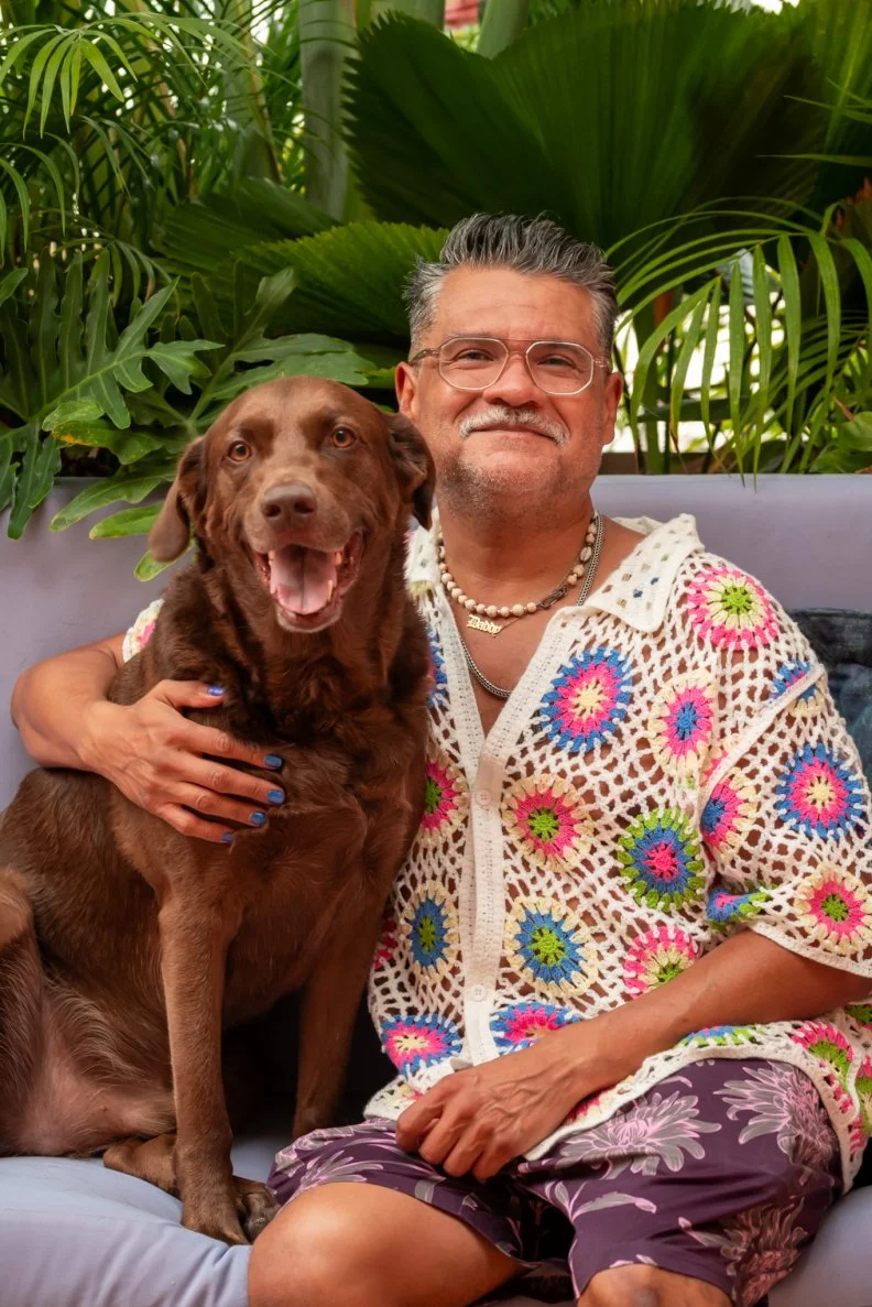 Chef Rick Martinez at home with his dog.