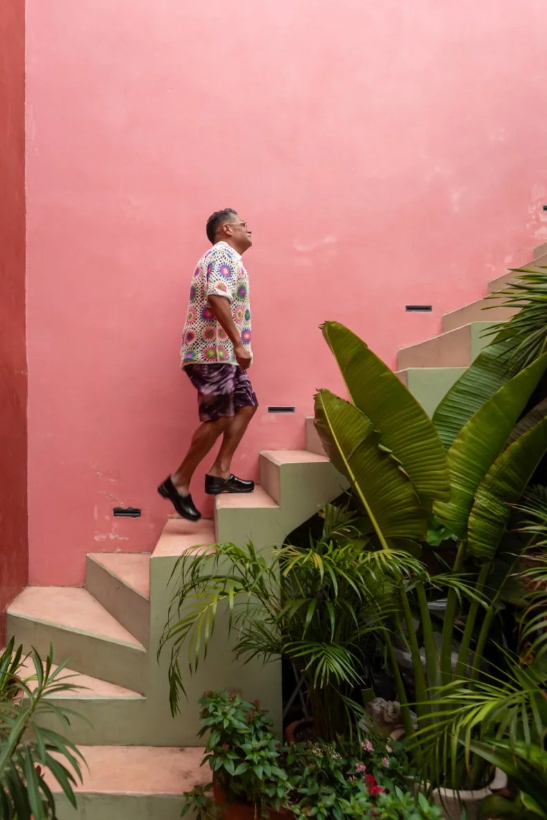 Rick Martinez features color inside and outside his personality-infused Mexican home. The stairs lead to Rick's upstairs kitchen which he often uses for TV shoots.