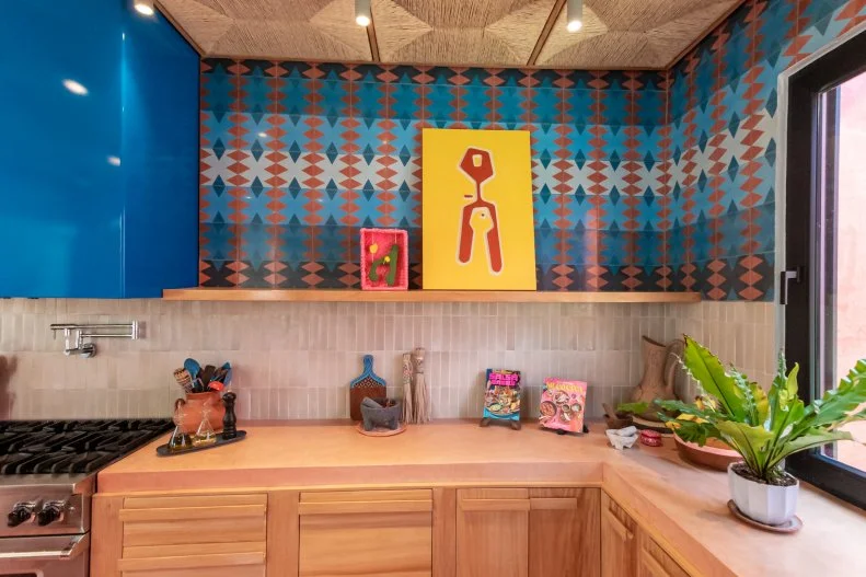 Rick's entire home is a celebration of Mexican contemporary art and craftsmanship as in this wonderfully graphic tile that offers a bold touch of color and pattern in his upstairs kitchen. More of Rick's equally modernist art collection has pride of place in the kitchen where he cooks surrounded by design and decor he loves.