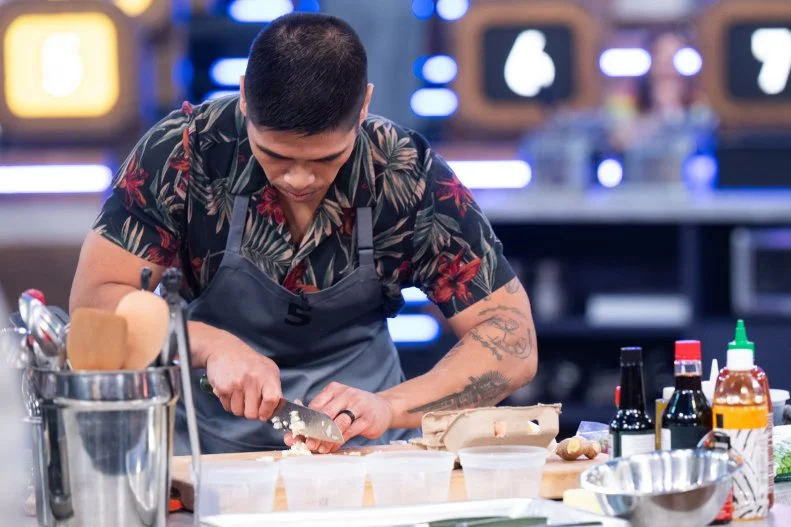 100 Cooks contestant Matthew Santos make an egg dish