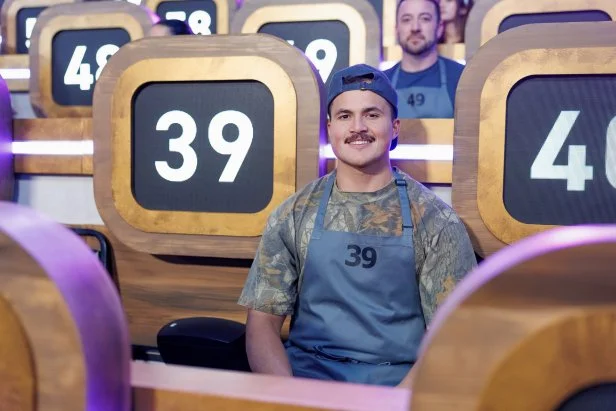 Bryce Stubbs waits for his number to be called in the first episode of 100 Cooks