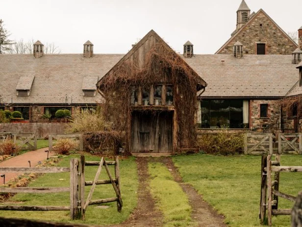 The Blue Hill at Stone Barns restaurant stands in Pocantico Hills, New York, U.S., on Friday, April 21, 2017. As customers are increasingly demanding free-range meat from smaller producers, just a handful of large slaughterhouses handle a disproportionate amount of that American meat: of those approximately 1,100 facilities, 215 large slaughter establishments produce about 75 percent to 90 percent of the country's volume.