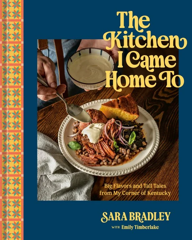 Book cover of Sara Bradley and Emily Timberlake's "The Kitchen I Came Home To: Big Flavors and Tall Tales from My Corner of Kentucky."