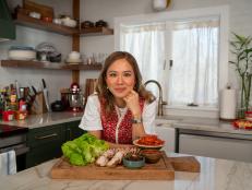 Host Esther Choi poses with her Halmoni Kimchi and Bossam.