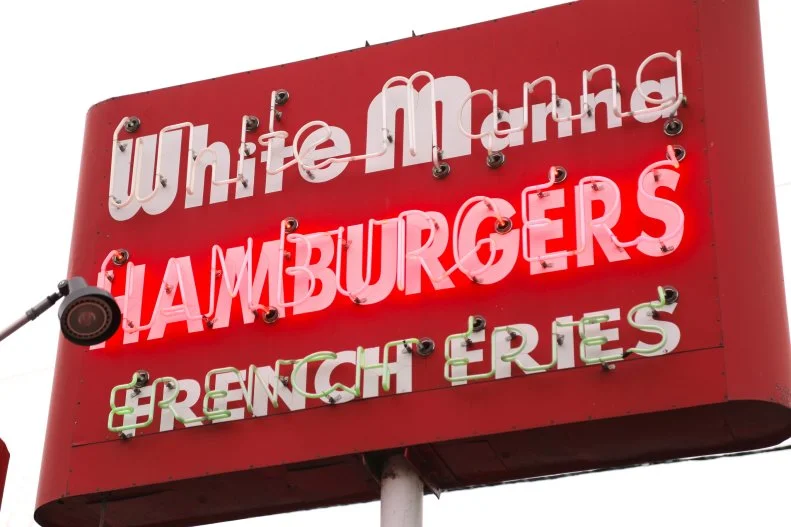 Exterior signage at White Manna in Hackensack, New Jersey, as seen on Triple D Nation, Season 4.
